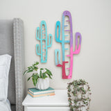 Painted cactus shaped wooden trellis on the wall with syngonium